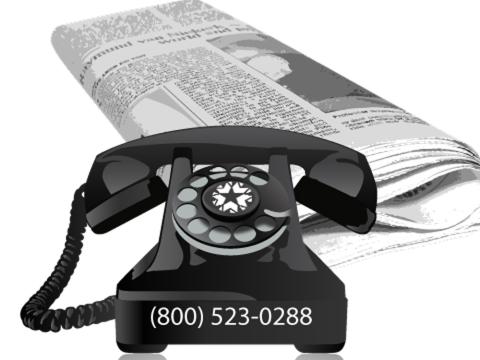 An old fashion telephone and a newpaper with  (800) 523-0288.